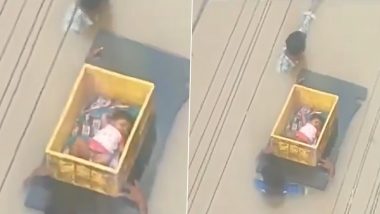 Andhra Pradesh Rains: Video of Men Carrying Baby in Box in Flood Water in Vijayawada Goes Viral