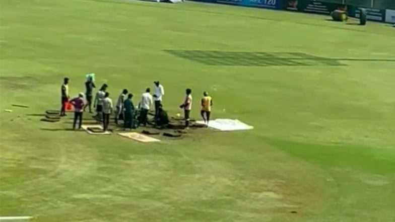 Groundstaff Dig Up Wet Patches From Greater Noida Sports Complex Stadium to Replace It With Dry Grass, Attempts to Quickly Commence AFG vs NZ One-Off Test 2024 (Watch Video)