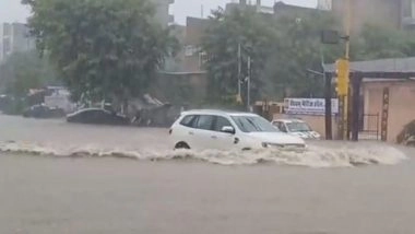 India News | Rajasthan: Heavy Rainfall in Jaipur Leads to Waterlogging, Triggers Traffic Disruptions