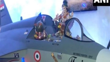 Entertainment News | Ganpati Idol Seated on LCA Tejas Mark 1A Fighter Jet Replica at Mumbai Residence