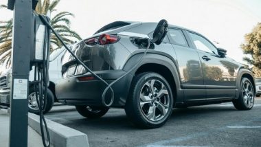 Business News | World EV Day: Over 50% of 3-wheelers, About 5% of 2-wheelers, and 2% of Cars Bought in 2024 Are EVs.