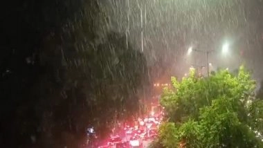 India News | Heavy Rain Lashes Parts of Delhi-NCR; Commuters Face Traffic Snarls, Waterlogged Routes