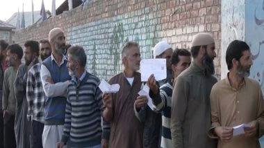 India News | J and K Polling: Voters Wait in Queues to Cast Votes in Pulwama