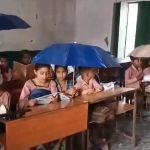 Baghpat: Students Allegedly Forced To Study Using Umbrellas at Government School in Uttar Pradesh As Water Leaks From Ceiling of Classroom, Videos Go Viral