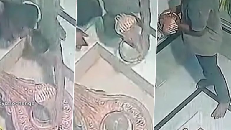 Theft Caught on Camera in Chhapra: Thief Steals Cobra Idol from Shivling at Baba Batukeshwar Nath Temple in Bihar, CCTV Footage Goes Viral