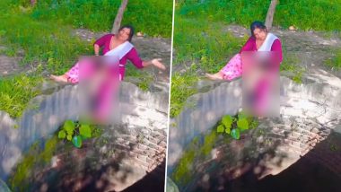 Reels Craze: Woman Sits on Edge of Open Well to Record Social Media Reel As Kid Clings On to Her Leg, Viral Video Surfaces