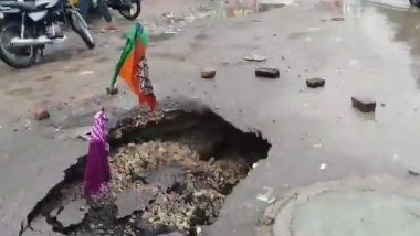 Raebareli: Part of Road Caves In, Angry Locals Place BJP Flag Inside Sinkhole; Video Goes Viral