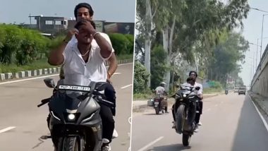 Kanpur Bike Stunt: Duo Perform Dangerous Bike Stunts on Uttar Pradesh Highway, UP Police React After Intagram Reel Goes Viral (Watch Videos)