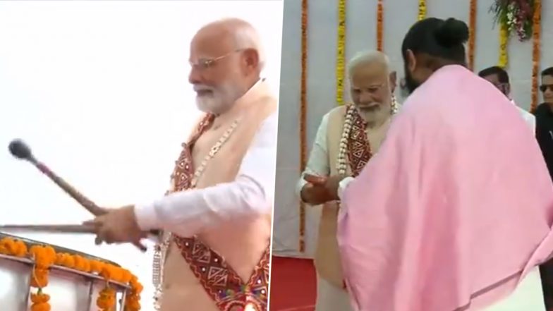 PM Narendra Modi Pays Tribute to Sant Sevalal Maharaj and Sant Ramrao Maharaj in Washim, Tries Traditional Dhol in Poharadevi’s Jagdamba Mata Temple (Watch Videos)