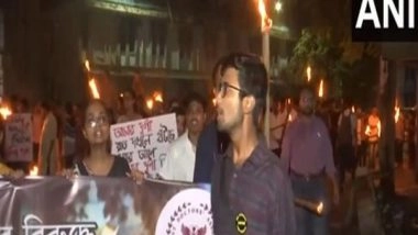 India News | Kolkata Rape-murder: North Bengal Medical College and Hospital Holds Torch-light Rally