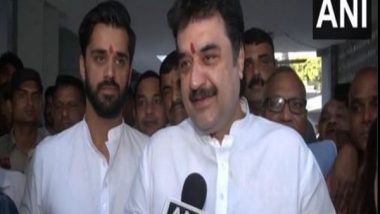 India News | Haryana: BJP Leader Kuldeep Bishnoi and Son Bhavya Cast Vote, Confident of BJP Victory