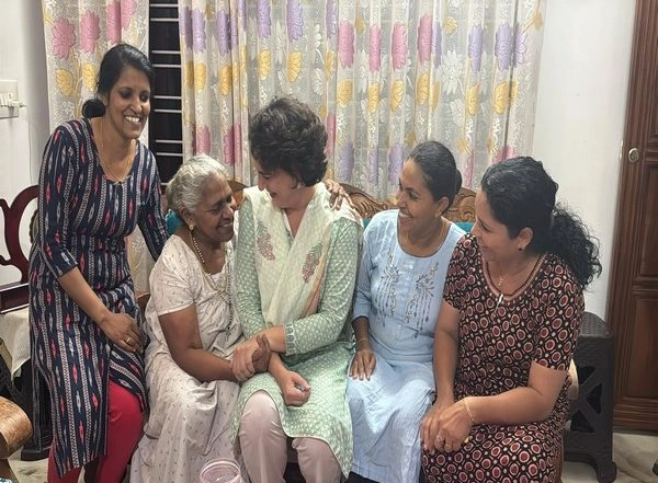 India News | Priyanka Gandhi Meets Local Family in Wayanad Day Before Filing Her Nomination