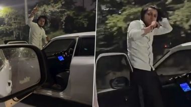 Noida: Youth Smokes Chillum While Standing on Gate of Moving Car, Police Responds After Video Goes Viral