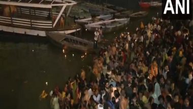 India News | Uttar Pradesh: Devotees Throng Varanasi to Take Holy Dip in River Ganga on Kartik Purnima