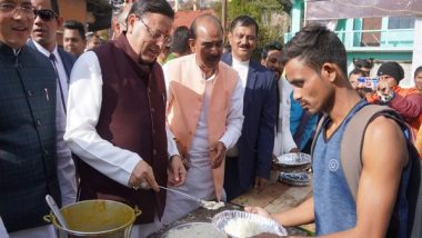 India News | Uttarakhand CM Dhami Distributes Food to Youth Who Came for Territorial Army Recruitment in Pithoragarh