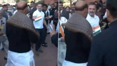 Rahul Gandhi Gives Rose, Tiranga to Rajnath Singh During Protest Outside Parliament (Watch Video)