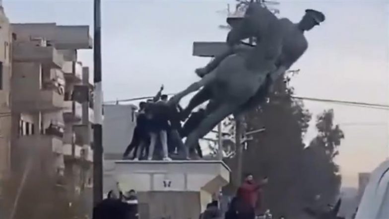 Assad Regime Falls: Syrian Rebels Tear Down Bashar al-Assad Statue in Damascus (Watch Video)