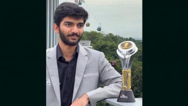 Gukesh D Poses With FIDE World Chess Championship Trophy After Beating Ding Liren Ahead of Closing Ceremony in Singapore (Watch Video)