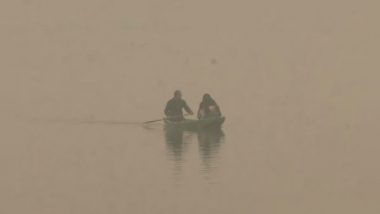 India News | Srinagar: Fog Shrouds Dal Lake, Houseboats and Shikaras Float in Silence