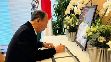 World News | Former Japanese PM Yoshihide Suga Signs Condolence Book in Memory of Manmohan Singh at Indian Embassy