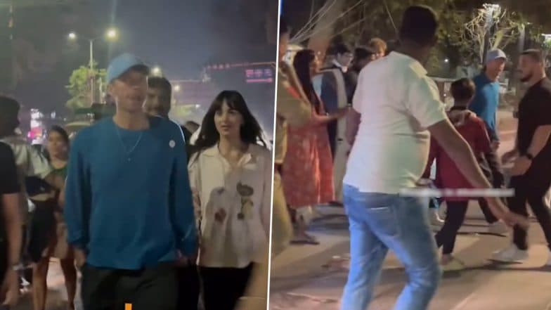 Chris Martin and Dakota Johnson Stroll Through Ahmedabad Streets After Coldplay’s Epic ‘Music of the Spheres’ World Tour 2025 Finale Concert in India (Watch Video)