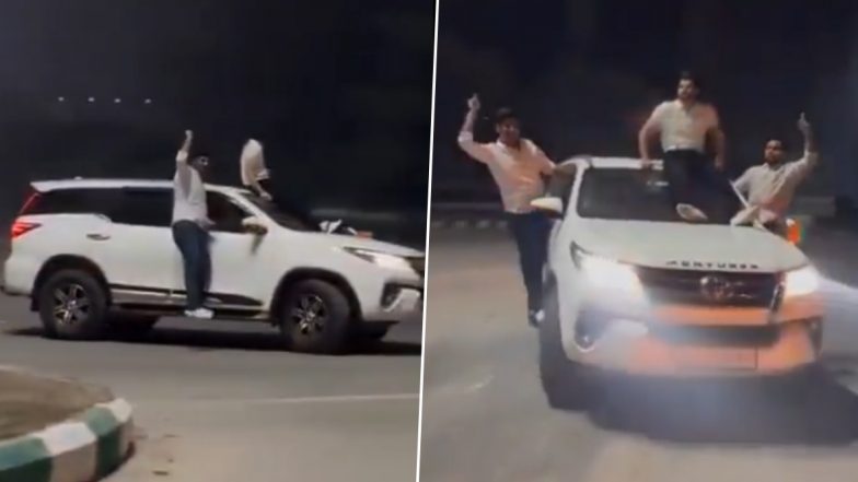 Noida Fortuner Stunt: Viral Video Shows Men Making Reels Sitting on SUV’s Bonnet and Clinging On to Door, Traffic Police Impose INR 33,000 Fine