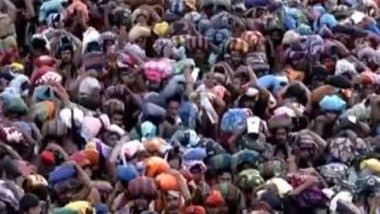 India News | Kerala: Devotees Throng Sabarimala Temple on Makaravilakku