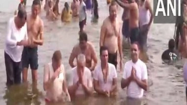 India News | Maha Kumbh: Union Minister Arjun Ram Meghwal Takes a Holy Dip in Triveni Sangam