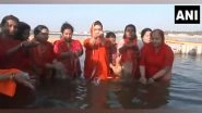 India News | Prayagraj: BJP's Aparna Bisht Yadav Takes Holy Dip at Triveni Sangam