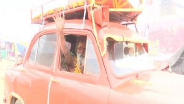 Mahakumbh Mela 2025: Ambassador Baba Aka Mahant Raj Giri Naga Baba Arrives at Prayagraj in His Saffron Colored Car (Watch Video)