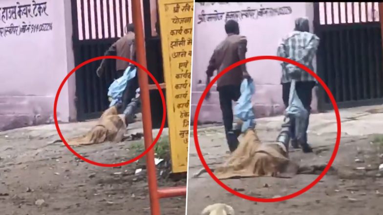 Jhansi Shocker: 2 Men Drag Body By Its Legs Outside Postmortem House in Uttar Pradesh, Probe Launched After Video Goes Viral