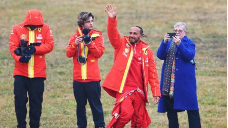 Lewis Hamilton Waves to Fans After Taking His Maiden Lap in Ferrari F1 Car for Upcoming Season