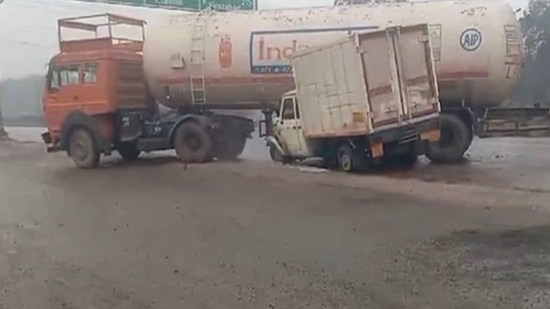 Uttar Pradesh Road Accident: Gas Tanker and Pickup Vehicle Collide Near Chakarpur Mandi on National Highway 2, Cause LPG Leakage and Traffic Jam (Watch Video)