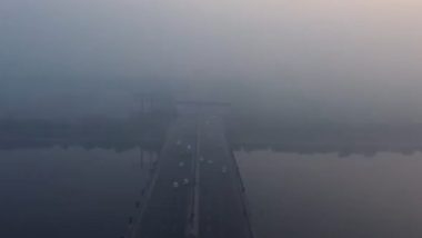 Delhi Weather Forecast and Update: Delhiites Wake Up to Blanket of Dense Fog As Cold Wave Grips City, Minimum Temperature May Drop to 8 Degrees Celsius (Watch Videos)