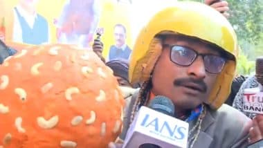 ‘Kejriwal Took Votes But Did Not Work’: Man Dressed As ‘PK’ Celebrates BJP’s Comeback, Holds Giant Laddoo at Counting Centre in Delhi (Watch Video)