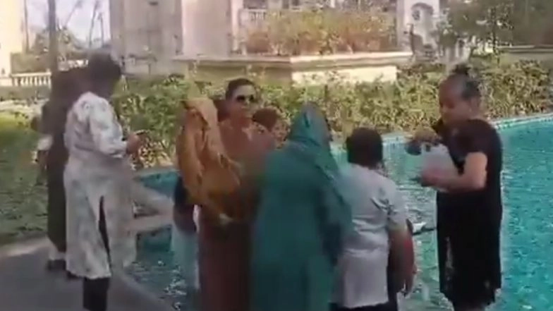 Sangam in Noida: ATS Society Residents Pour Mahakumbh’s Holy Water Into Pool, Offer Prayers; Netizens React, ‘Why Didn’t We Think of That?’ (Watch Video)