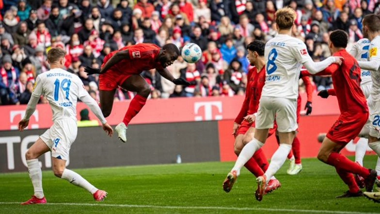 Harry Kane Brace Helps Bayern Munich Survive Late Scare in 4–3 Win Over Holstein Kiel    