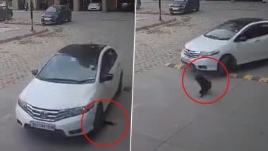 Ghaziabad Horror: Narrow Escape for Child Playing in SG Grand Society As Car Driven by Woman Runs Him Over in Uttar Pradesh, CCTV Video Surfaces