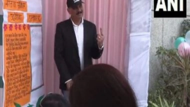 India News | Delhi Polls: Navy Chief Admiral Dinesh K Tripathi Cast His Vote