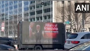 World News | US: Mobile Billboard Advertising Truck Displays Boards Featuring Pictures of PM Modi, Trump