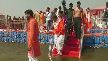 India News | Education Minister Dharmendra Pradhan Takes Holy Dip at Triveni Sangam