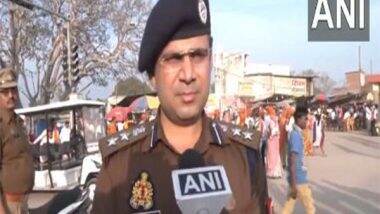 India News | Ayodhya: Crowd Control Measures in Place as Devotees Throng to City to Offer Prayers