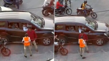 Bengaluru: Man Halts Car in Middle of Busy Road Near Hulimavu in Karnataka, Argues With Woman Traffic Police Officer After Being Asked Not To Jump Signal (Watch Video)