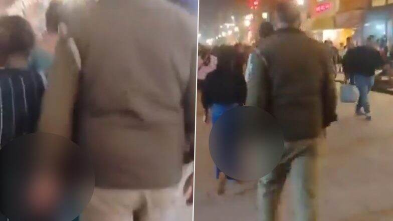 Varanasi: Cop Allegedly Touches Women and Girls Inappropriately From Behind While Walking, Probe Ordered After Shocking Video Goes Viral