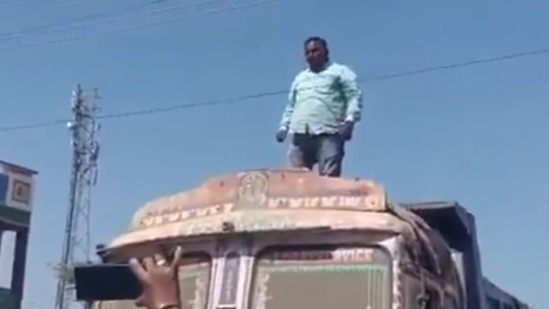 Telangana: Man Climbs Truck, Threatens To Electrocute Himself Outside Peddapalli RTO Office Alleging Bribery Demand; Video Surfaces
