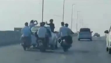 Amroha: Youths Drink Alcohol While Hanging Out of Moving Car on Highway in Uttar Pradesh, Police Launch Probe After Video Goes Viral