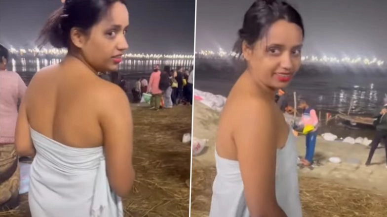 Mahakumbh 2025 Viral Video: Woman Wears Only Thin Towel While Taking Holy Dip in the Ganges For Sacred Bathing Ritual, Instagram Reel Sparks Mixed Reactions Online (Watch)