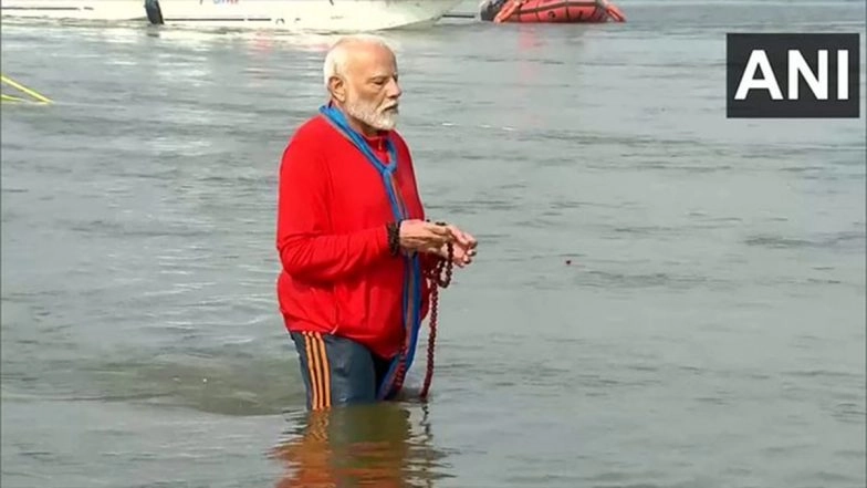 PM Modi Takes Holy Dip at Sangam