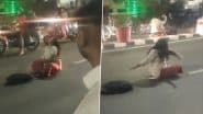 Lucknow: Woman Sits in Middle of Road, Twirls Head and Swings Arms Outside Lohia Hospital in Vibhuti Khand; Police Respond After Video Goes Viral