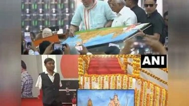 India News | PM Modi Signs Painting by Renowned Mouth, Foot Painter Manoj Bhingare in Surat Rally